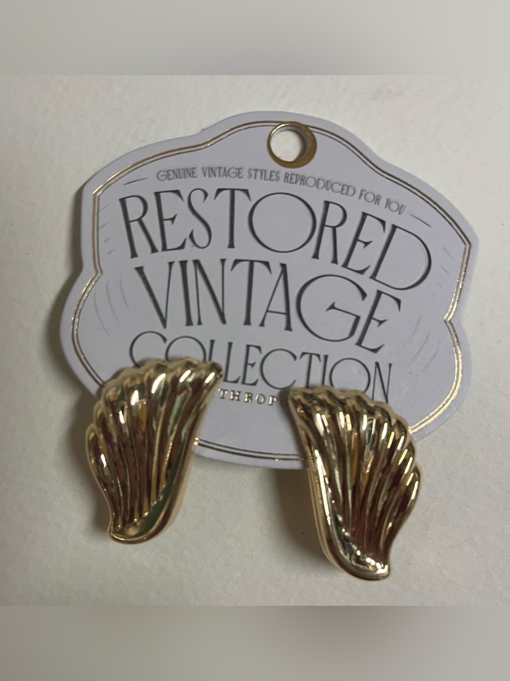 Anthropologie Gold Sculpted Wing Pierced Earrings